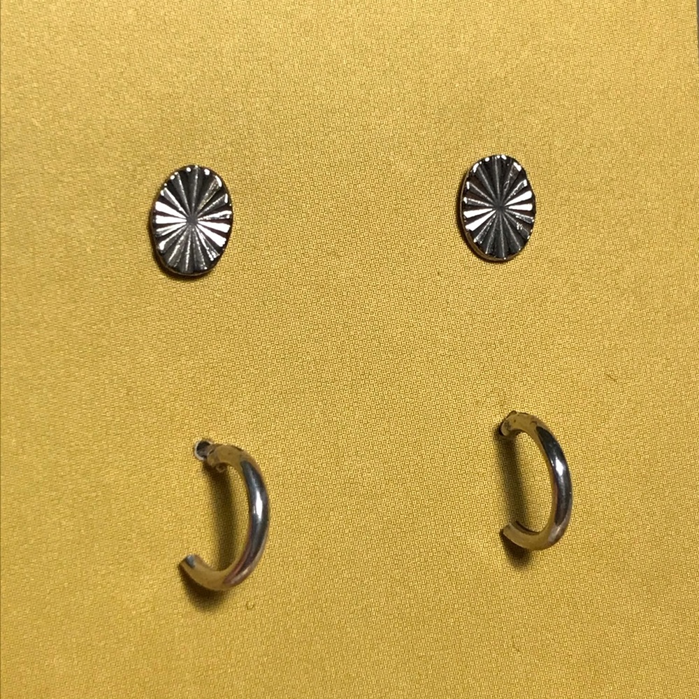 Silver toned studs and tiny hoops